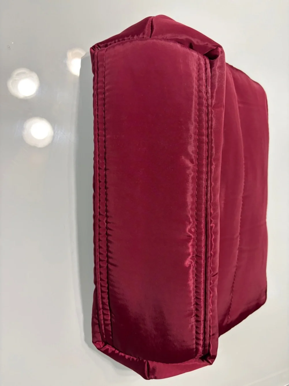 Ted Baker Burgundy Quilted Cosmetic Pouch with Gold Hardware